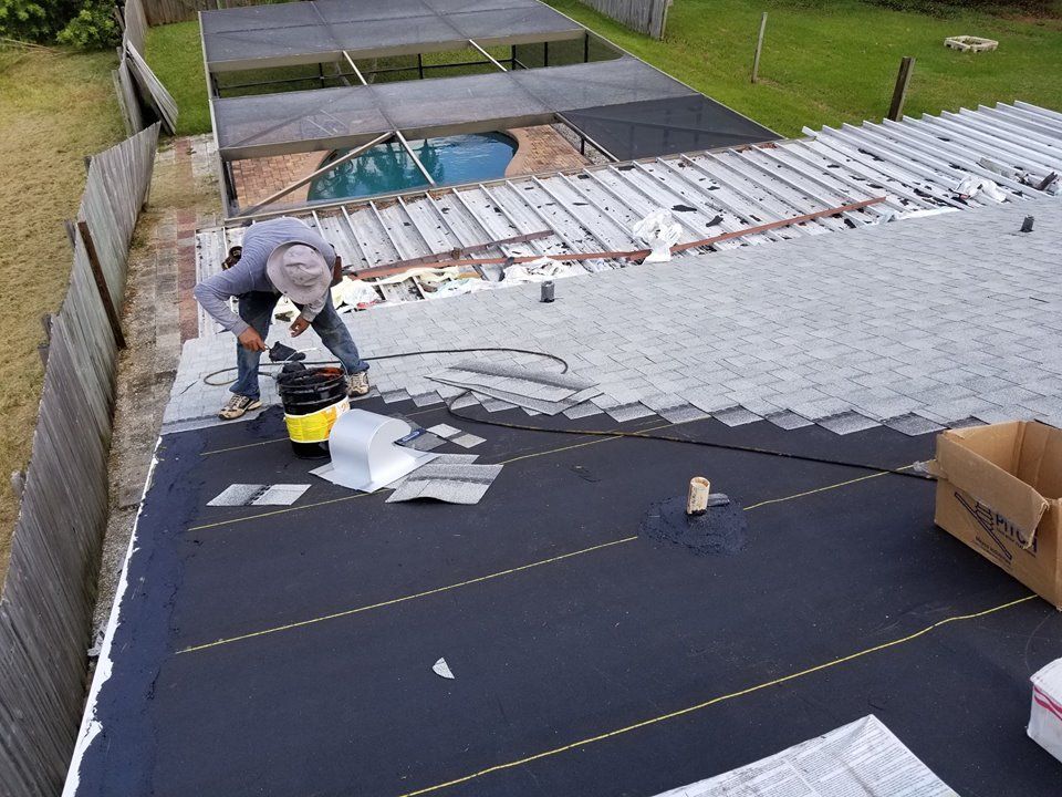 Coastline Roofing team at work